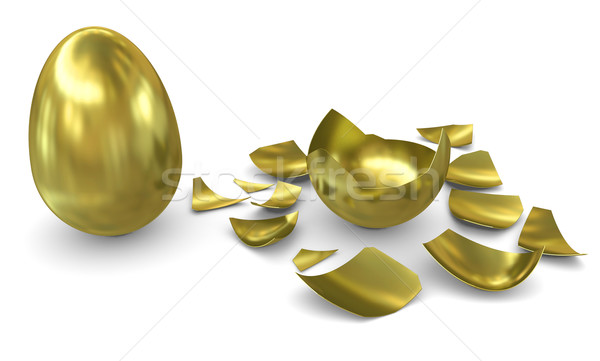 Golden egg on a white background: not hatched and hatched Stock photo © cherezoff