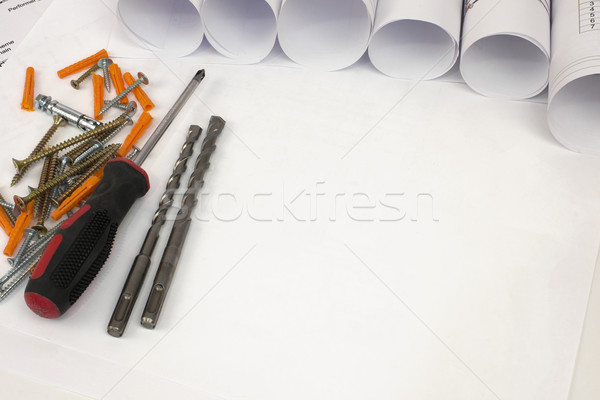 Scrolls of architectural drawings and tools Stock photo © cherezoff