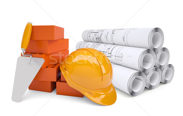 Scrolls of architectural drawings and work tools with helmet Stock photo © cherezoff
