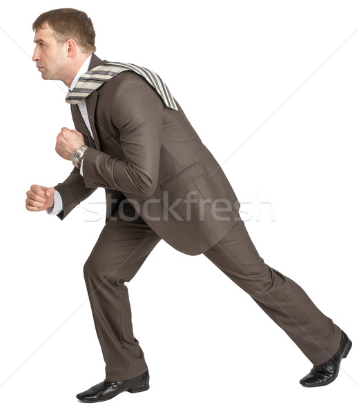 Businessman pulling invisible rope Stock photo © cherezoff