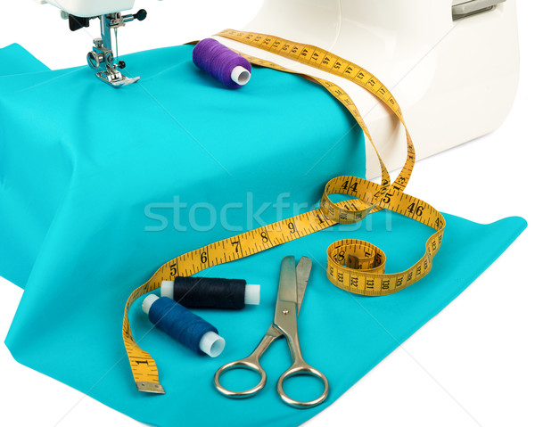 Sewing machine with fabric, threads and scissors  Stock photo © cherezoff