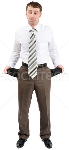 Businessman turned out his pockets Stock photo © cherezoff