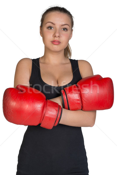Woman in boxing gloves with her hands crossed on breast Stock photo © cherezoff