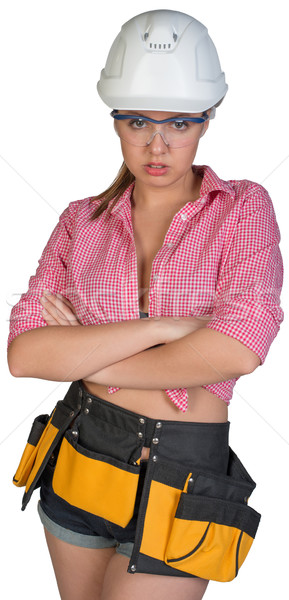 Woman in hard hat, protective glasses and tool belt Stock photo © cherezoff