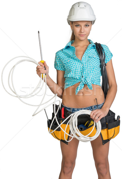 Woman in hard hat and tool belt holding coil of cable Stock photo © cherezoff