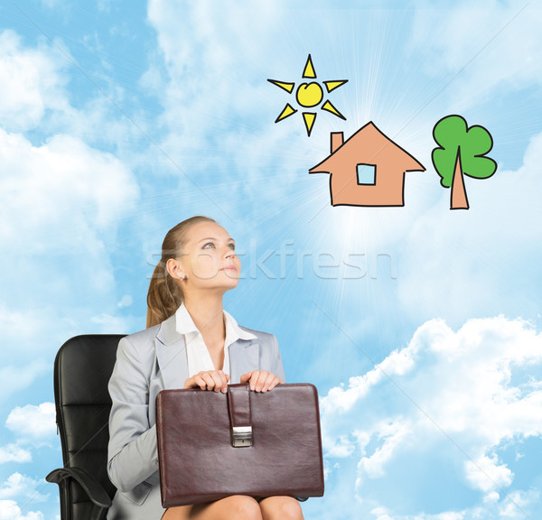 Zakenvrouw rok blouse jas vergadering stoel Stockfoto © cherezoff