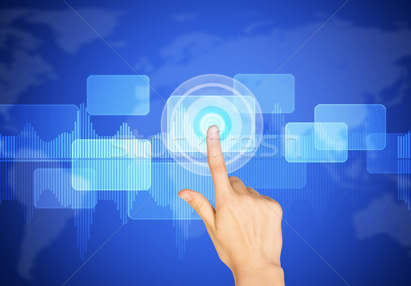 Humans arm pressing on virtual screen Stock photo © cherezoff