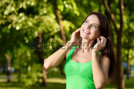 dreaming woman laying on grass Stock photo © chesterf