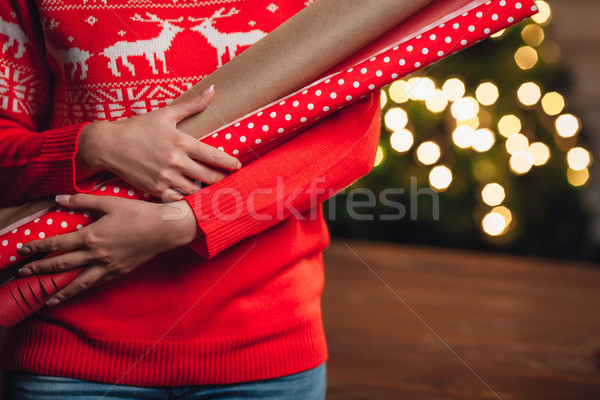 woman hands closeup holding wrapping kraft paper for gifts Stock photo © chesterf