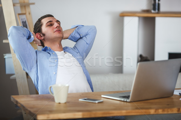 Portré dolgozik férfi otthon nyugodt laptop Stock fotó © chesterf