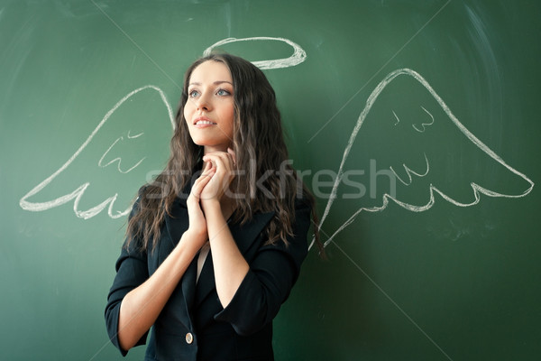 Stock photo: girl over chalkboard with funny picture