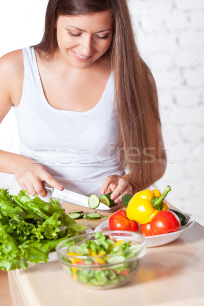 woman cooking salad Stock photo © chesterf