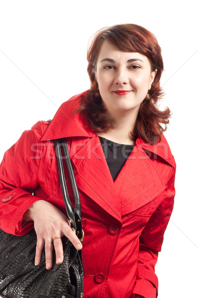 portrait of woman in red coat Stock photo © chesterf