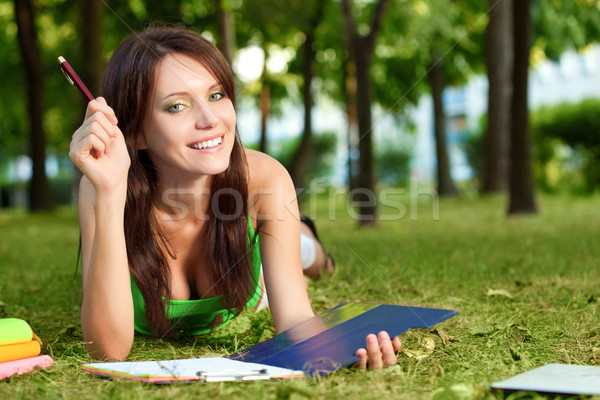 student girl laying on grass Stock photo © chesterf
