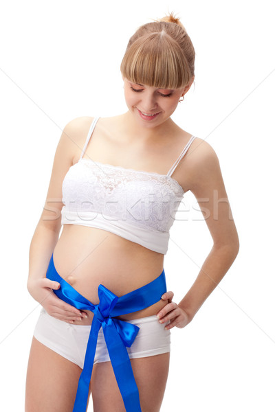 pregnant woman  with blue bow on belly Stock photo © chesterf