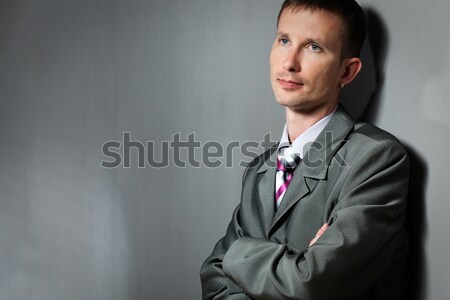 thinking businessman portrait near wall Stock photo © chesterf