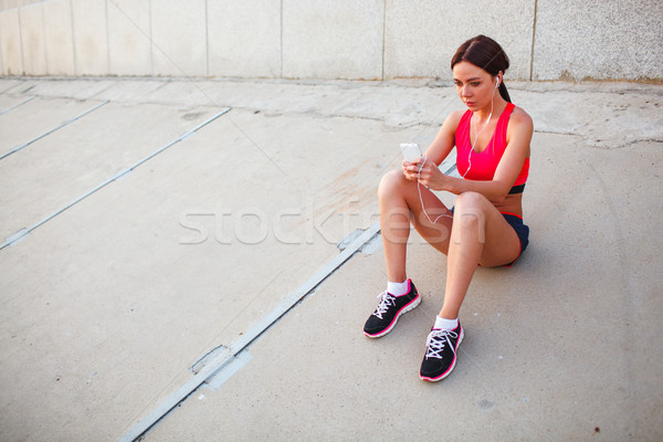 Сток-фото: сидят · Runner · женщину · прослушивании · музыку · изображение