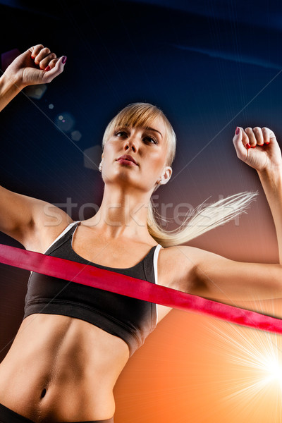 woman finishing through red tape Stock photo © chesterf
