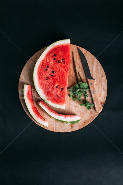 Friss görögdinnye szeletek tányér fa vágódeszka Stock fotó © chesterf