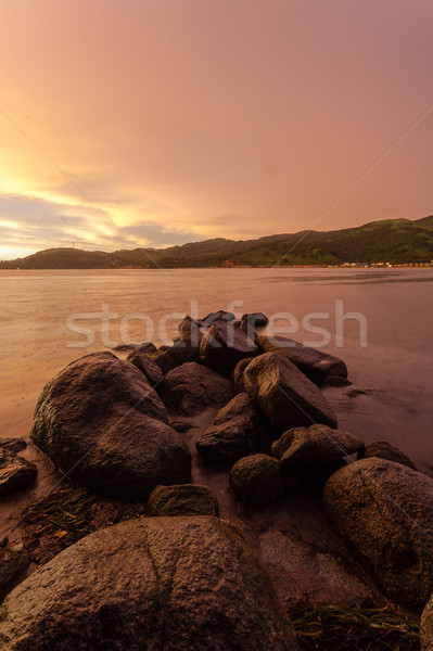 dramatic sunset skies in the sea bay Stock photo © chesterf