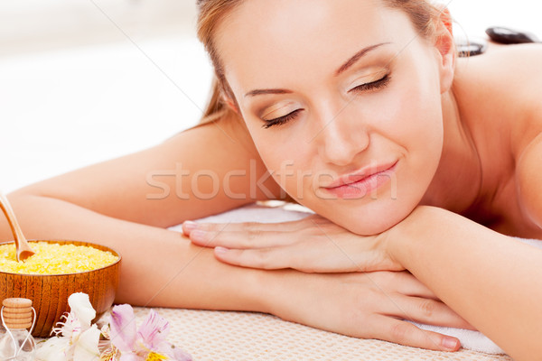 woman receiving spa stones therapy Stock photo © chesterf