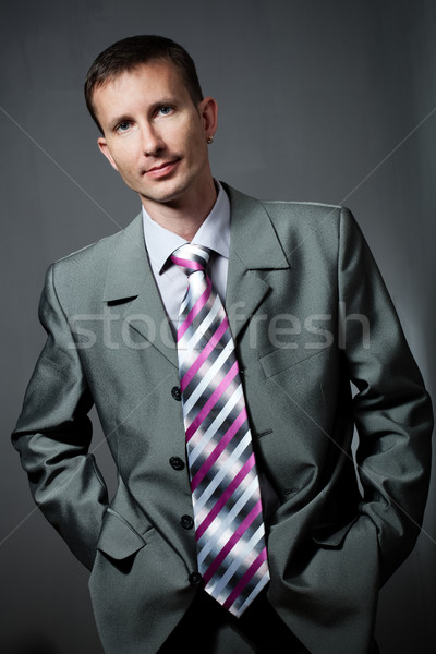 buisnessman portrait over gray Stock photo © chesterf