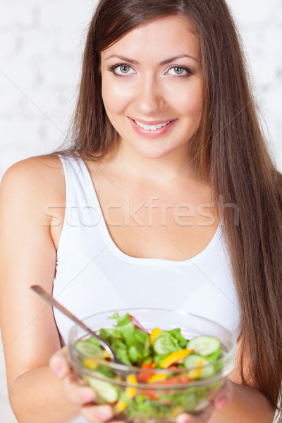 beautiful brunette woman eating salad Stock photo © chesterf