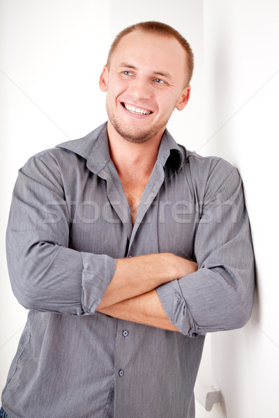 man standing near wall Stock photo © chesterf