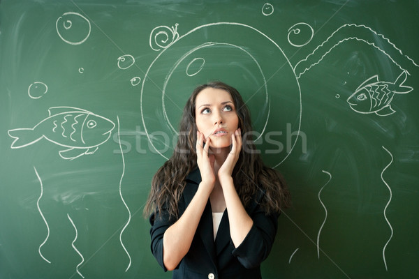 girl over chalkboard with funny picture Stock photo © chesterf