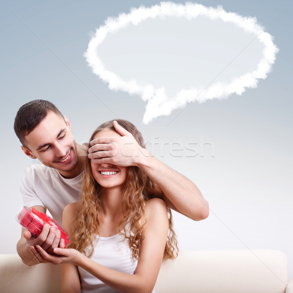 man giving heart-shaped box  for his girlfriend Stock photo © chesterf