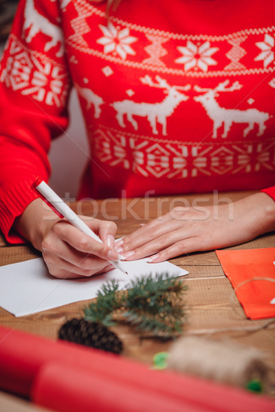 [[stock_photo]]: Femme · mains · écrit · Noël · carte · postale