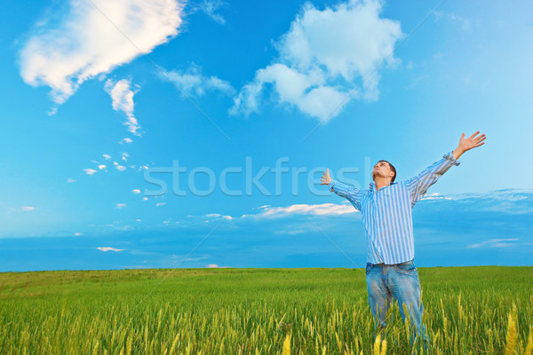 Stock photo: young man on filed