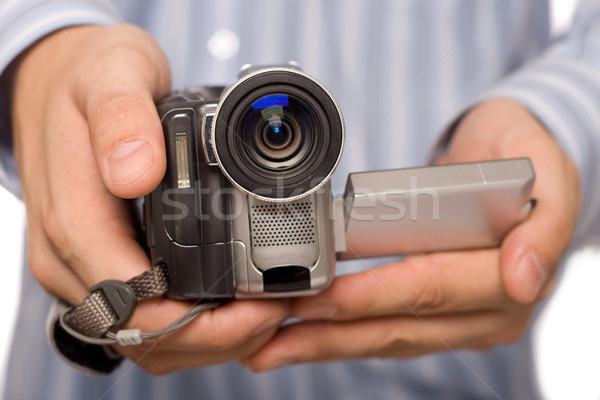 miniDV camcoder in man hands Stock photo © chesterf