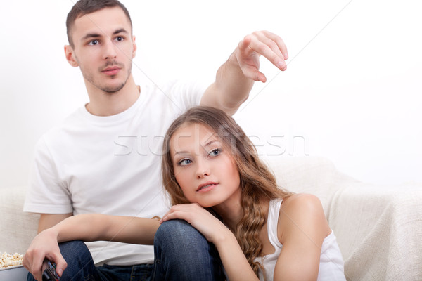 young couple watching tv Stock photo © chesterf