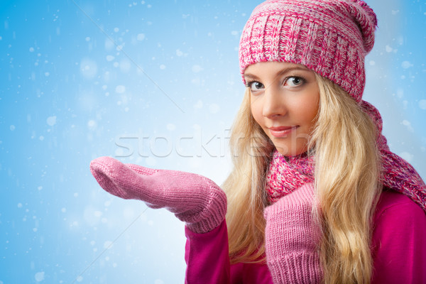 woman catching snowflakes Stock photo © chesterf