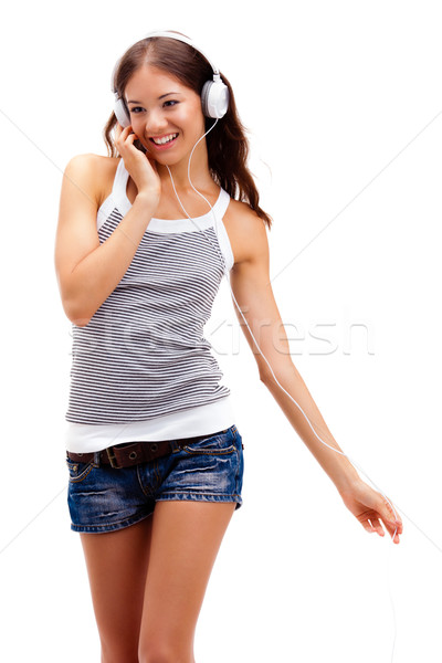 Młodych happy girl słuchawki biały dziewczyna Zdjęcia stock © chesterf
