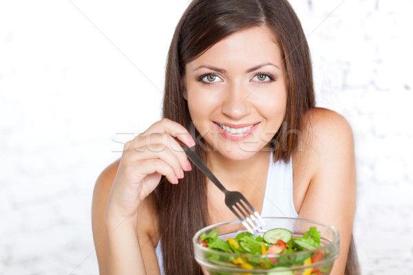 beautiful brunette woman eating salad Stock photo © chesterf