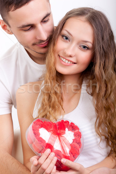 man giving heart-shaped box  for his girlfriend Stock photo © chesterf