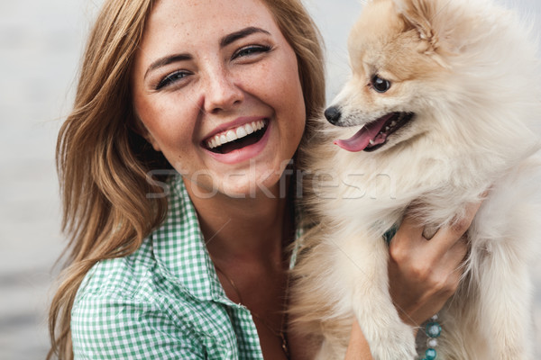 Stock photo: beautiful girl with her little cute dog