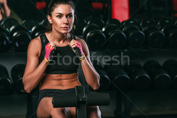 fitness woman doing abdominal crunch in gym woking out  Stock photo © chesterf
