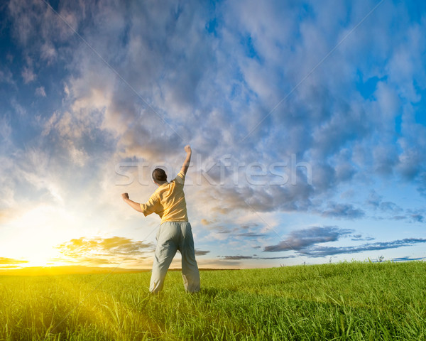 man rising up hand Stock photo © chesterf