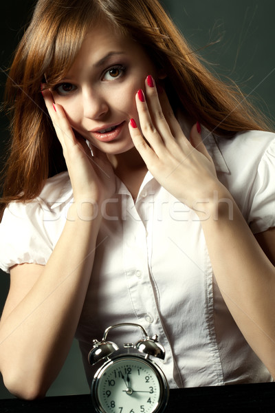 Stock photo: business woman and alarm clock