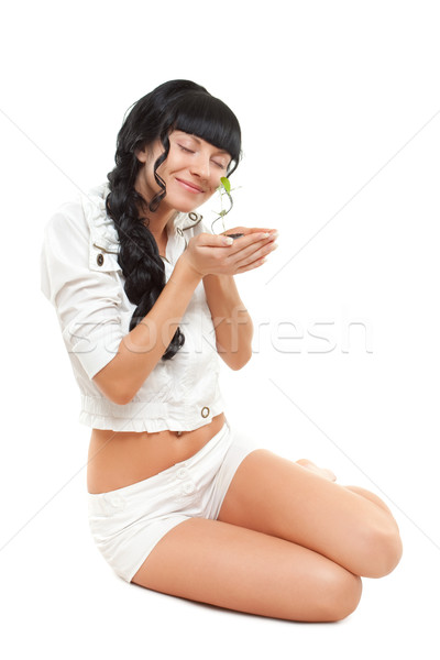 woman holding green plant Stock photo © chesterf