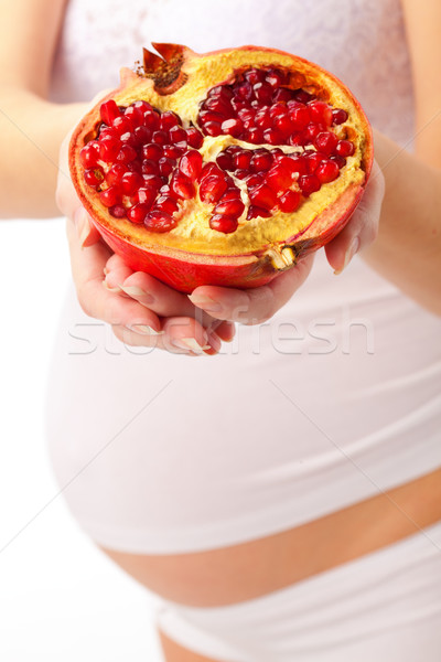Terhes nő gránátalma has piros fehér család Stock fotó © chesterf
