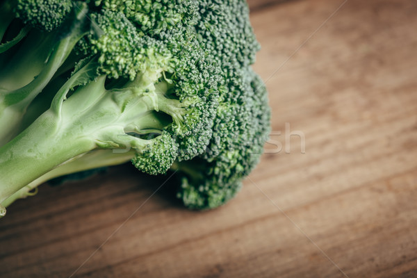 Fresh green broccoli on wood table Stock photo © chesterf