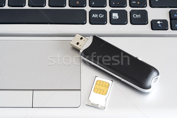 Notebooka modem usb działalności pracy technologii Zdjęcia stock © cheyennezj