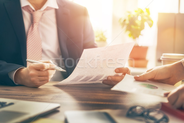 Man and woman working in office Stock photo © choreograph