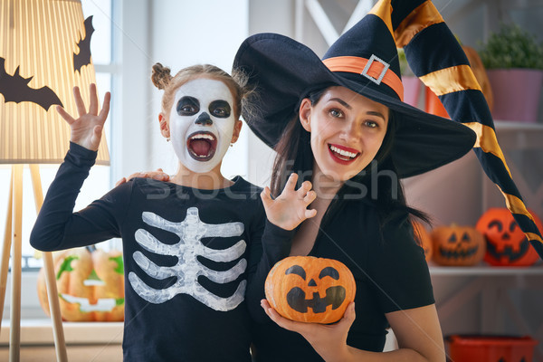 Stock photo: family celebrating Halloween