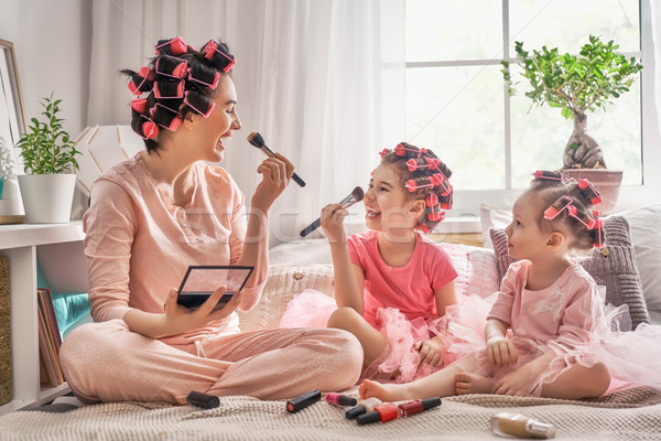 Mom and children doing makeup Stock photo © choreograph