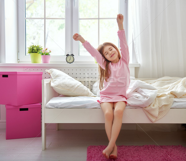 Stock photo: girl wakes up